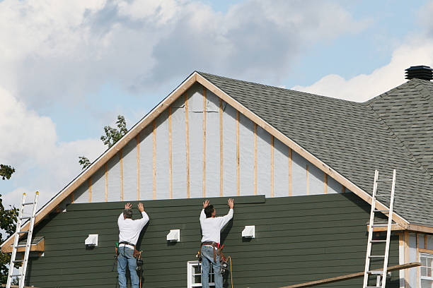 Professional Emergency Siding Repair technician working in Colchester, IL